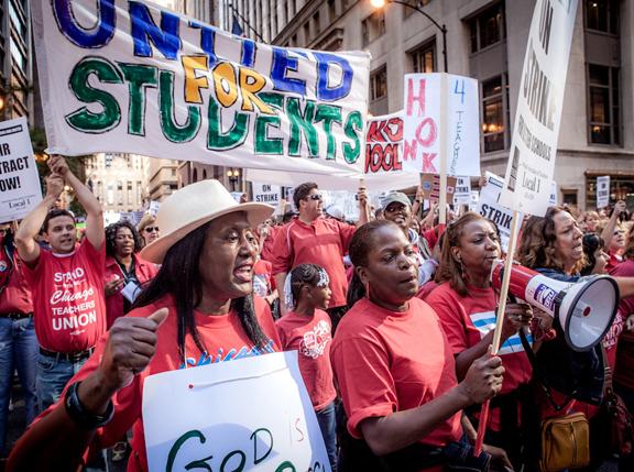 CTU strikers join in a mass rally downtown during the first days of the strike
