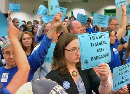 Portland teachers protest outside a session of the school board