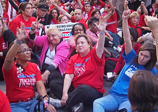 Chicago's teachers show their unity during a sit-in
