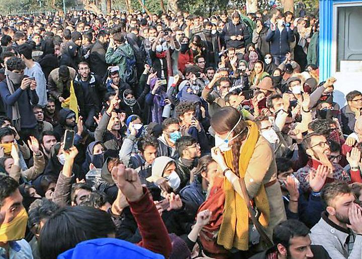 Students and workers participate in the wave of popular protests sweeping across Iran