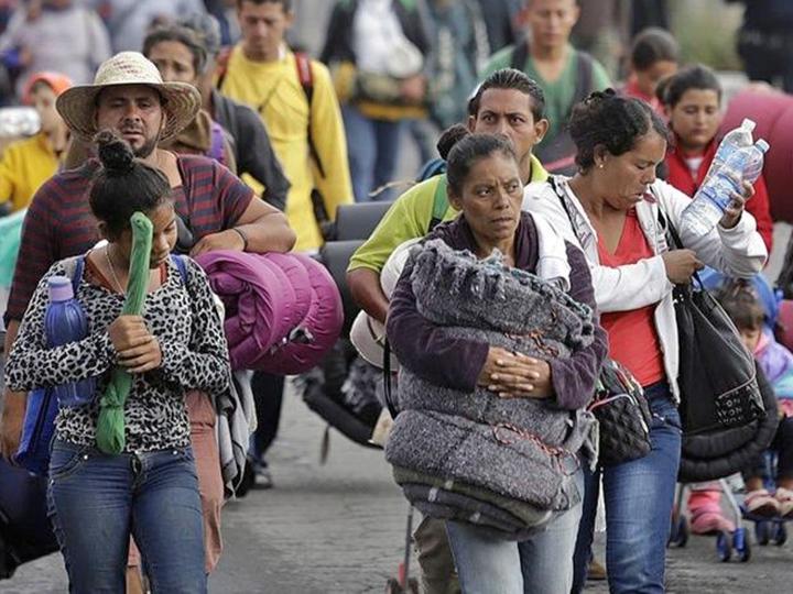 A migrant caravan from Central America reaches Mexico City