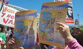 Protesters call for San Francisco to act as a sanctuary city at a demonstration against the Minutemen