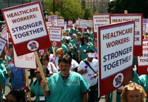 Thousands of health care workers marched in September against a plan to put the UHW in trusteeship