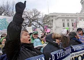 "The Women of Steel" join tens of thousands of other workers on the march in Madison