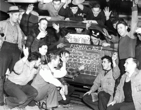 Flint sit-down strikers celebrate their victory inside one of the occupied plants