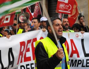 Spanish workers march during the recent multinational strike in Europe