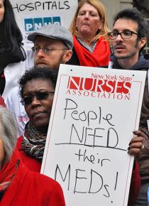 Health care providers, volunteers and activists demand more relief efforts outside New York's City Hall