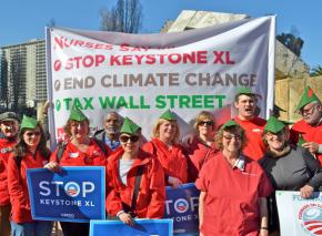 Members of National Nurses United protest the Keystone XL pipeline