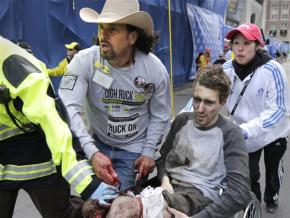 Ordinary people, like antiwar activist Carlos Arredondo (in hat), leapt into action after the bombings