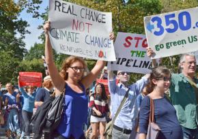 Anti-fracking activists march against the newly opened Spectra pipeline