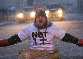 Protesters mark International Human Rights Day with a sit-in against deportations in Elizabeth, N.J.