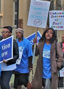 Parents on the march against a city plan to "turn around" their kids' school