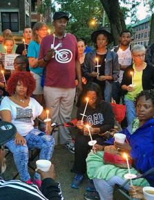 Hunger strikers outside Chicago's Dyett High School surrounded by supporters
