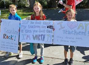 Students join their teachers on the picket line to show support
