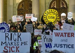 UAW members join protests outside the Michigan Capitol building