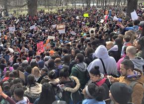 Boston high school students participate in a mass walkout against cuts