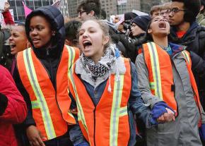 New York City high school students stage a mass walkout to protest Trump's Muslim ban