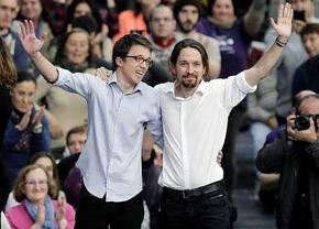 Podemos leaders Íñigo Errejón (left) and Pablo Iglesias greet supporters at the party conference in Vistalegre