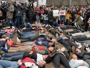 Students stage a die-in outside the White House following the Stoneman Douglas High School shooting
