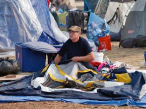Fire evacuees live in temporary shelters by a Walmart in Chico, California