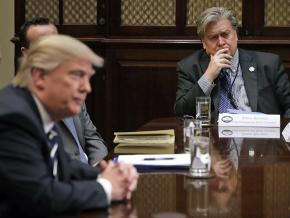 Donald Trump presides over a White House event as Steve Bannon (right) looks on