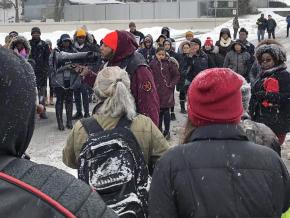 Community members protest the strip-searching of students at a Binghamton middle school